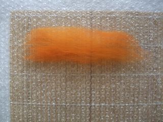 Second tuft of wool