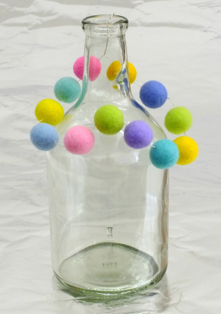 Glass vase with bead hanger