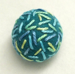 Seed stitch with variegated thread Seed stitch with variegated thread