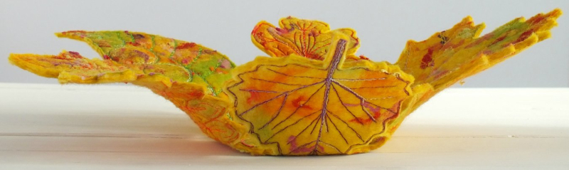 Side view of autumn leaves bowl